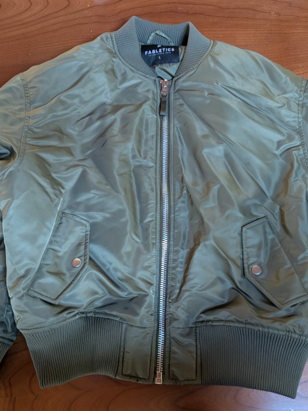 Fabletics bomber jacket new without tags. Green size large